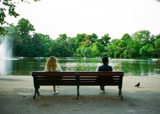 a couple sitting on a bench